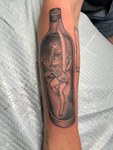 Explore autism puzzle piece tattoo ideas, creative tattoo ideas in Cape Coral, available at UNRIVALED INK