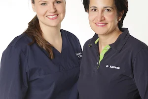 Dentists Dr. Mina Katawazi and W. M. Voss image