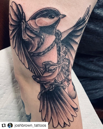 Explore hammer tattoo ideas, creative tattoo ideas in Rochester, available at Sacred Heart Studios