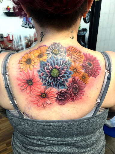 Tattoo Shop «Gallery Fine Art & Tattoo Studio», reviews and photos, 2515 E Jolly Rd # 2, Lansing, MI 48910, USA