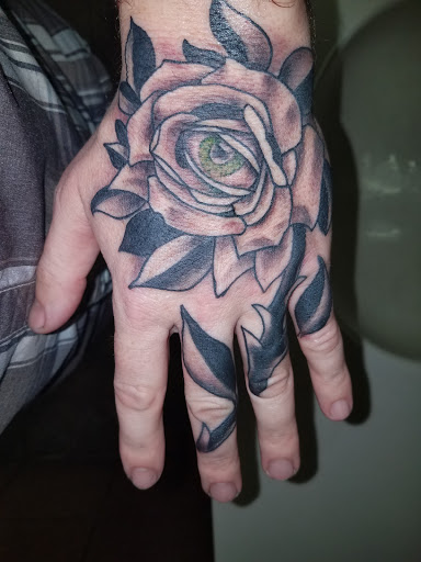 Explore hand tattoo ideas female, creative tattoo ideas in Augusta, available at The Lucky Seven Tattoo Co.