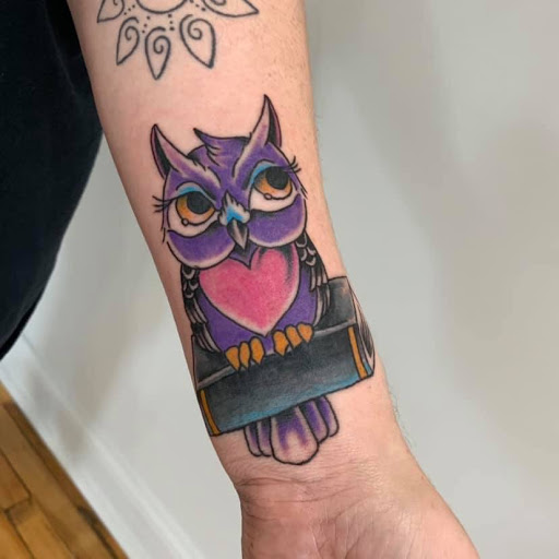 Explore cover up finger tattoo ideas, creative tattoo ideas in Kansas City, available at Golden Stag Tattoo and Gallery