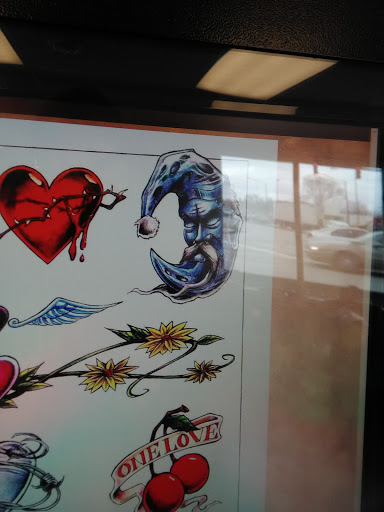 Explore wife name tattoo ideas on chest, creative tattoo ideas in Elyria, available at Body Revolution Tattoos & Body Piercings