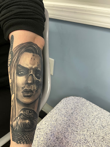 Explore nice arm tattoo ideas, creative tattoo ideas in Pittsburgh, available at Skin Deep Tattoo Gallery