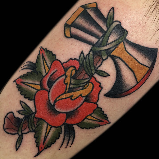Explore marigold tattoo ideas, creative tattoo ideas in Lakeland, available at Black Swan Tattoo
