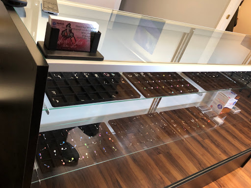 Find women's rib tattoo ideas for your next unique tattoo in Roxboro at Solo Ink Tattoo Shop Appointment Only