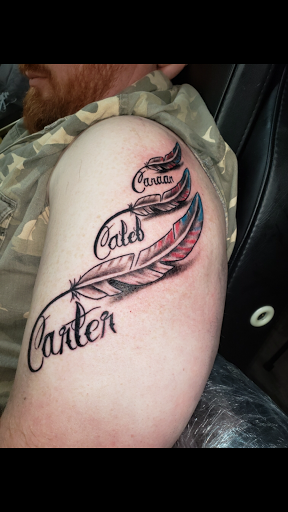 Explore tulip tattoo ideas, creative tattoo ideas in Warner Robins, available at Untold Pain Tattoo Studio