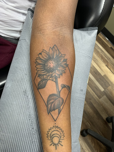 Explore leg tribal tattoo ideas, creative tattoo ideas in Fargo, available at Golden Dragon Tattoo