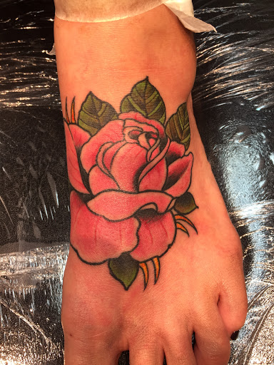 Explore lady and the tramp tattoo ideas, creative tattoo ideas in Neptune, available at Neptune Tattooville