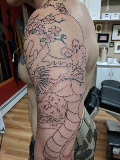 Explore front of neck tattoo ideas, creative tattoo ideas in Anchorage, available at Anchorage Tattoo Studio