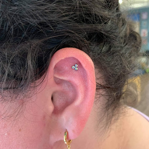 Explore tattoos tramp stamp ideas, creative tattoo ideas in Toledo, available at Piercings by Caitlin presents Holier Toledo