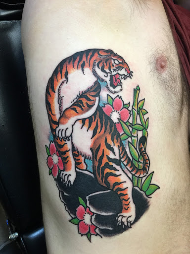 Explore men's neck tattoo ideas, creative tattoo ideas in Hamden, available at Burning Hearts Tattoo Co.