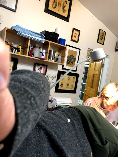 Explore stamp tattoo ideas, creative tattoo ideas in Woodstock, available at Woodstock Tattoo Studio