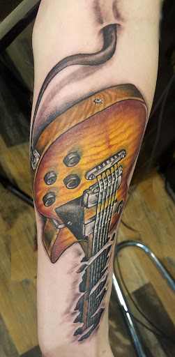 Explore jupiter tattoo ideas, creative tattoo ideas in Washington, available at Rockstar Tattoo and Piercing Studio LLC