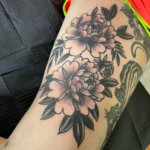 Explore roman tattoo ideas, creative tattoo ideas in Buffalo, available at True Gloom Tattoo Studio