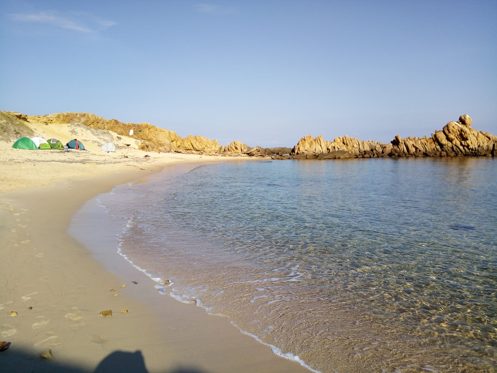 Photo of Plage Sidi el Bechir II with bright fine sand surface