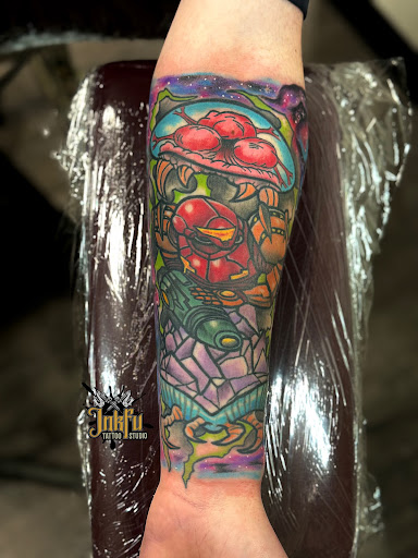 Explore thigh cover up tattoo ideas, creative tattoo ideas in Omaha, available at Inkfu Tattoo Studio