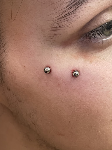 Explore men's back of neck tattoo ideas, creative tattoo ideas in Meadville, available at Outstabbing Curations