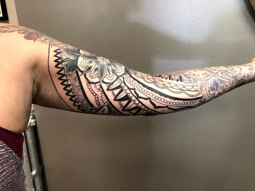 Explore forearm half sleeve tattoo ideas, creative tattoo ideas in Sauk City, available at The Madison Tattoo Company