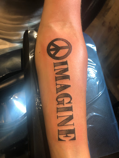 Explore charizard tattoo ideas, creative tattoo ideas in Cape Coral, available at UNRIVALED INK