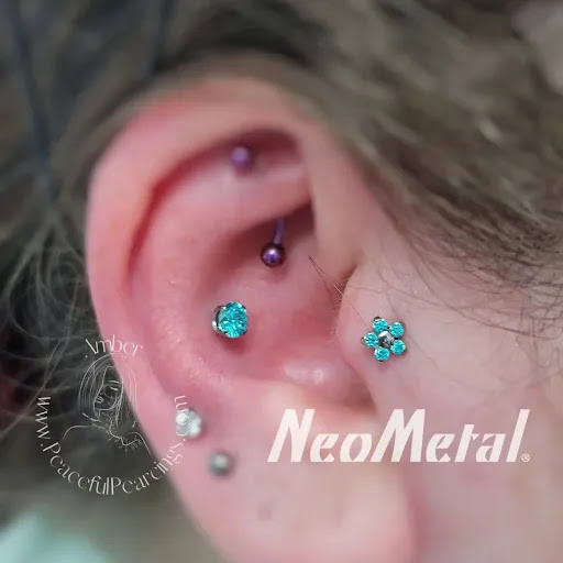 Explore unique hand tattoo ideas, creative tattoo ideas in Monroe, available at Peaceful Piercings LLC