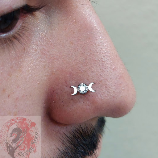 Explore dog bone tattoo ideas, creative tattoo ideas in Las Vegas, available at Primal Soul Piercing Studio