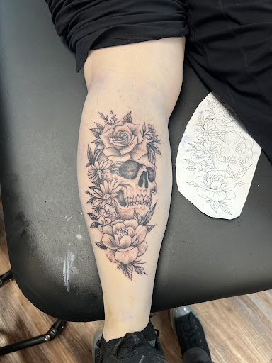 Explore cover up tattoo ideas lower back, creative tattoo ideas in Nazareth, available at Nocturnal Tattoo