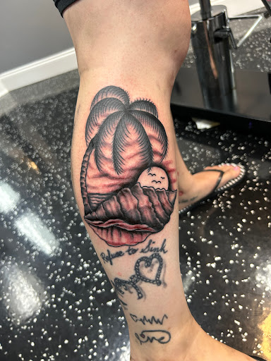 Explore lower leg tattoo ideas, creative tattoo ideas in Fort Myers, available at Loyal 2 The Coil Tattoos & Piercings (Edison Mall Location Entrance F)