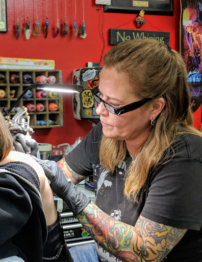 Tattoo Shop «Hellcat Tattoo», reviews and photos, 1896 Palm Beach Lakes Blvd #100, West Palm Beach, FL 33409, USA