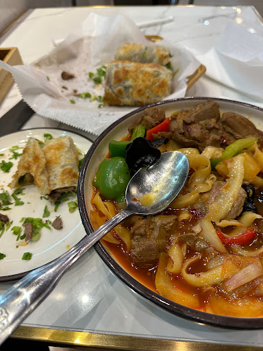 Beef roll pancake and savory braised chicken noodle 