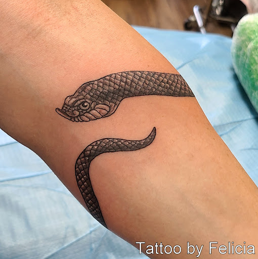 Explore mens face tattoos ideas, creative tattoo ideas in Fort Myers, available at Tiger Lotus Tattoo and Piercing