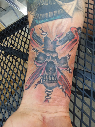 Tattoo Shop «The Greater Good Tattoo», reviews and photos, 105 E High St, Ashley, OH 43003, USA