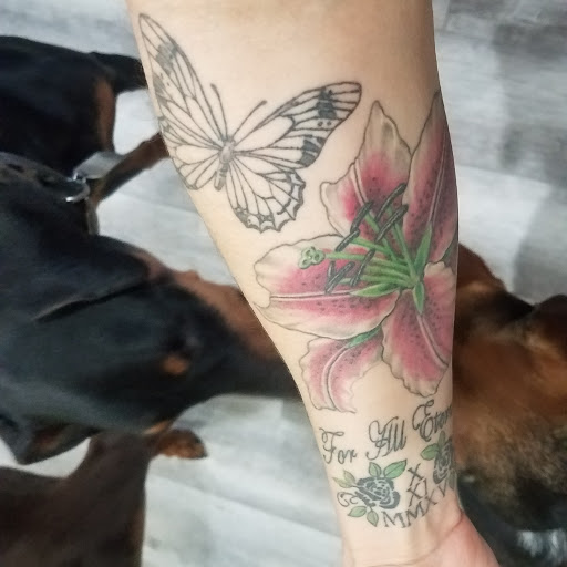 Explore name tattoo ideas for men, creative tattoo ideas in Sayville, available at Lotus Tattoo