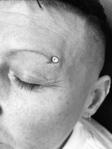 Explore lung cancer ribbon tattoo ideas, creative tattoo ideas in Denver, available at 5280 INK