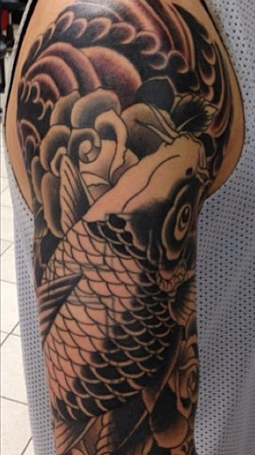 Explore black heart heart tattoo cover up ideas, creative tattoo ideas in Roanoke, available at Skin Thrills Tattoo & Body Piercing Studio