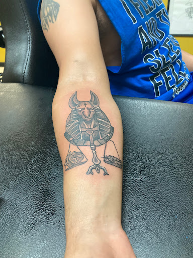 Explore february birth flower tattoo ideas, creative tattoo ideas in Cocoa, available at Rorschach Tattoo Shop and Piercing Studio