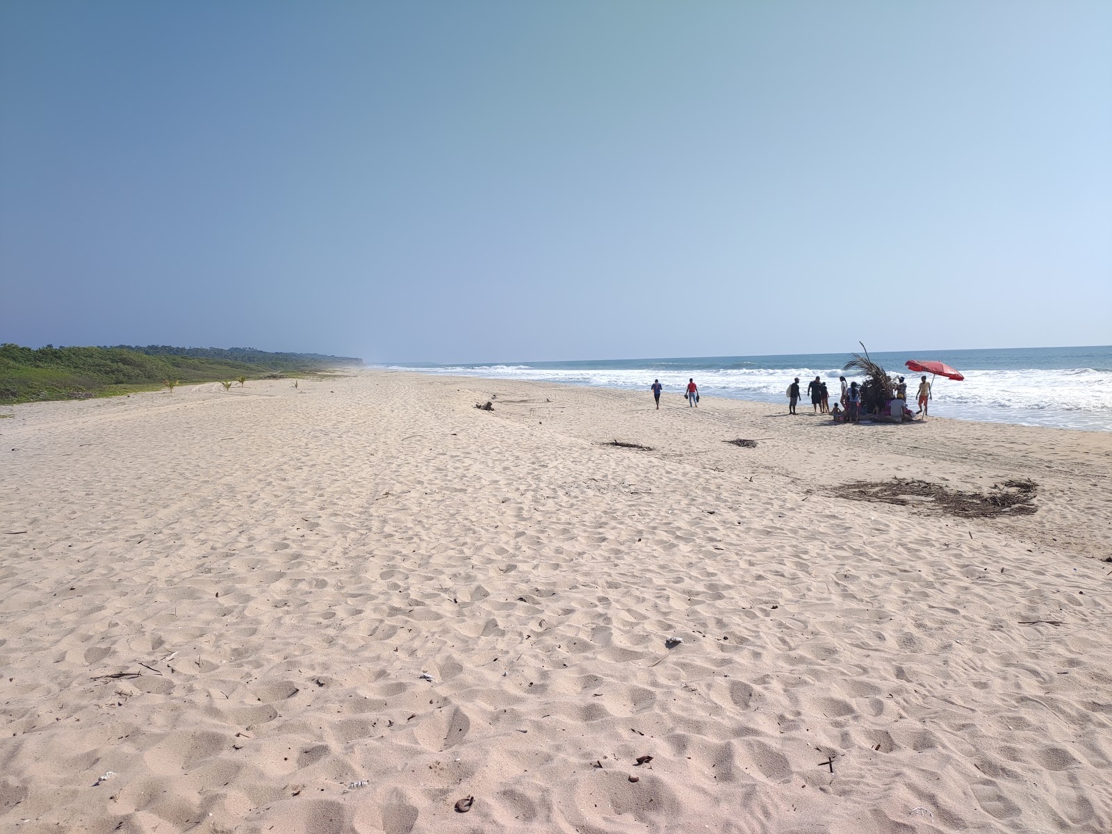 Foto av Playa El Tamale med ljus sand yta