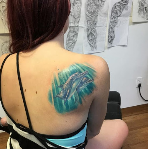 Tattoo Shop «Crossbones Tattoo & Piercings», reviews and photos, 19051 San Carlos Blvd #10, Fort Myers Beach, FL 33931, USA