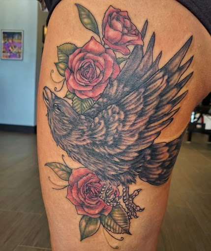 Explore forearm cross tattoo ideas, creative tattoo ideas in Palm Harbor, available at Angry Owl Tattoo and Piercing