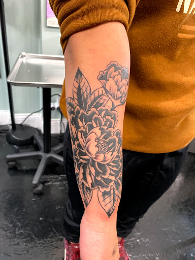 Explore dripping tattoo ideas, creative tattoo ideas in Saint Paul, available at Grand Avenue Tattoo