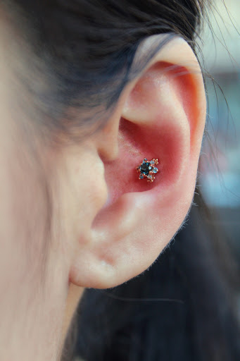 Explore hand skull tattoo ideas, creative tattoo ideas in Brooklyn, available at Ahimsa Piercing Studio & BVLA Fine Jewelry