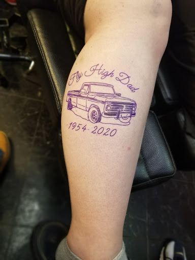 Explore tribal head tattoo ideas, creative tattoo ideas in Wilson, available at Everlasting Impressions Tattoo & Body piercings