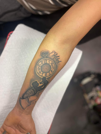 Explore wrap around tattoo ideas, creative tattoo ideas in Hartselle, available at Ethereal Alchemy Tattoo Collective
