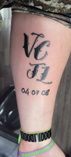 Explore skull sleeve tattoo ideas, creative tattoo ideas in Middletown, available at Traditionally Twisted Tattoo