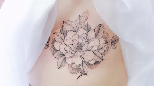Explore thistle tattoo ideas, creative tattoo ideas in Alhambra, available at DO.ART INK