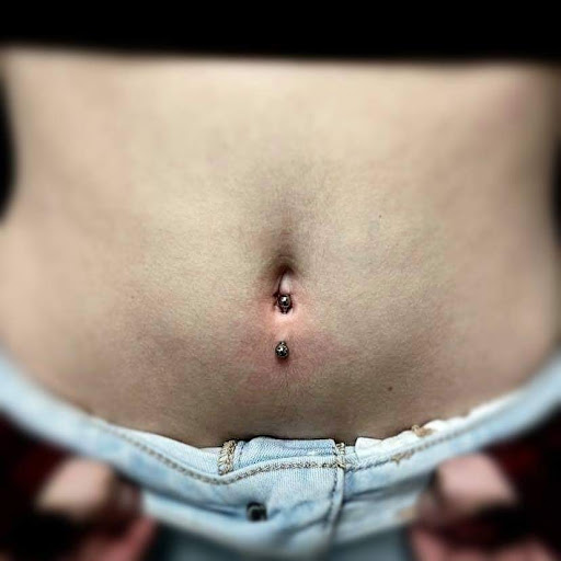 Explore motocross tattoo ideas, creative tattoo ideas in Nampa, available at Hippie Hoops and Holes