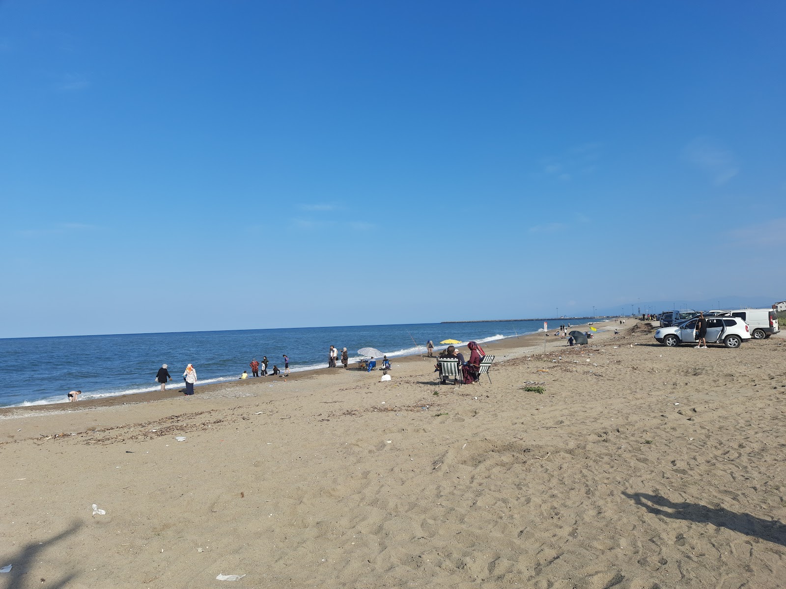 Foto von Tahtalikoy Plaji mit heller sand Oberfläche