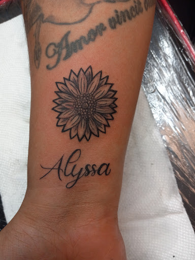 Explore traditional hand tattoo ideas, creative tattoo ideas in Warner Robins, available at McDonald Ink