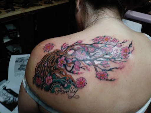 Tattoo Shop «Illinois Tattoo Co», reviews and photos, 109 W Monroe St, Bloomington, IL 61701, USA