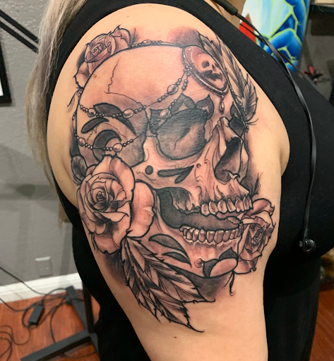Find in between boob tattoo ideas for your next unique tattoo in Redwood City at Gods & Titans Tattoo